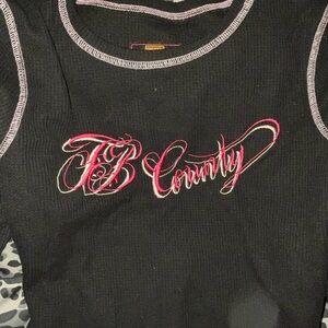 Black Long Sleeve Top with Pink Accents